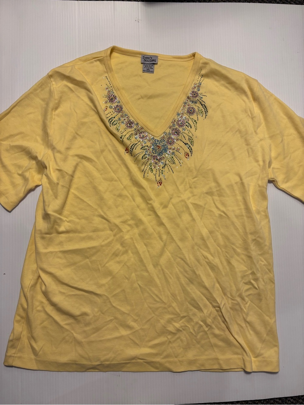 Isaac’s Designs 2x yellow shirt with rhinestone embellishment